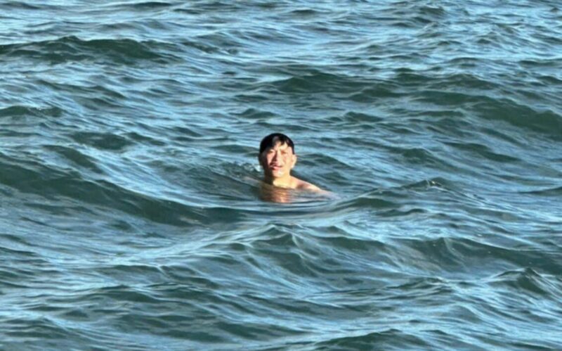 man treading water