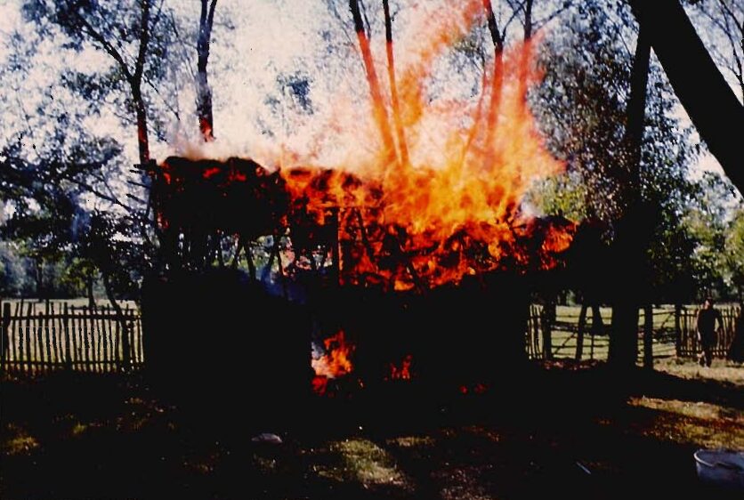 A cottage on fire.