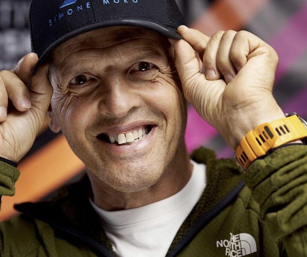 Close shot of ASimone Moro smiling and adjusting his cap.