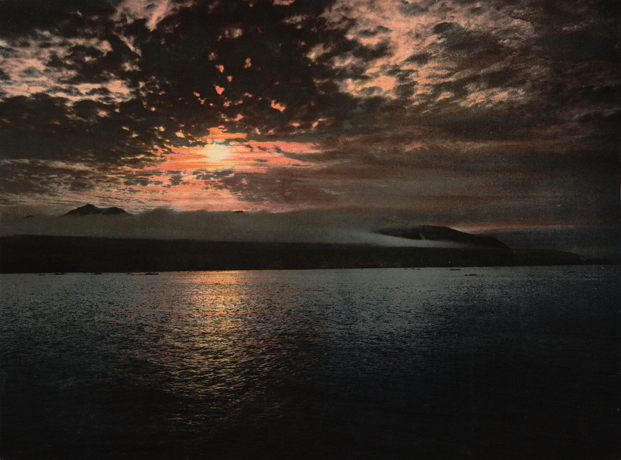 Midnight sun over an arctic sound