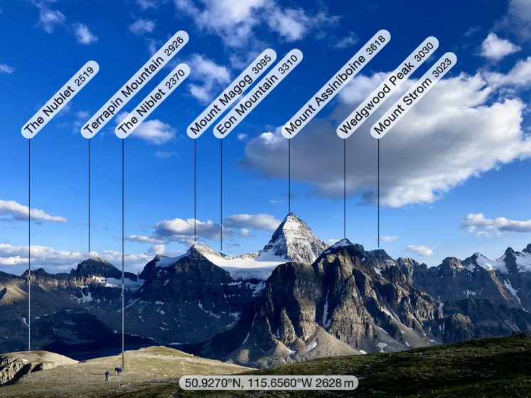 Eon Mountain, Mount Assiniboine, and other peaks of the area. 