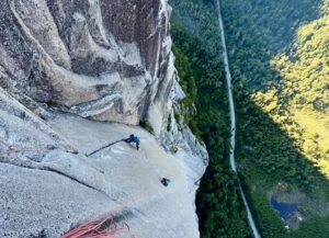 Climbing up the wall on new route.