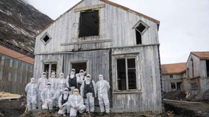 The restoration team outside the villa.