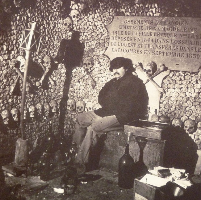 A man sitting in the catacombs