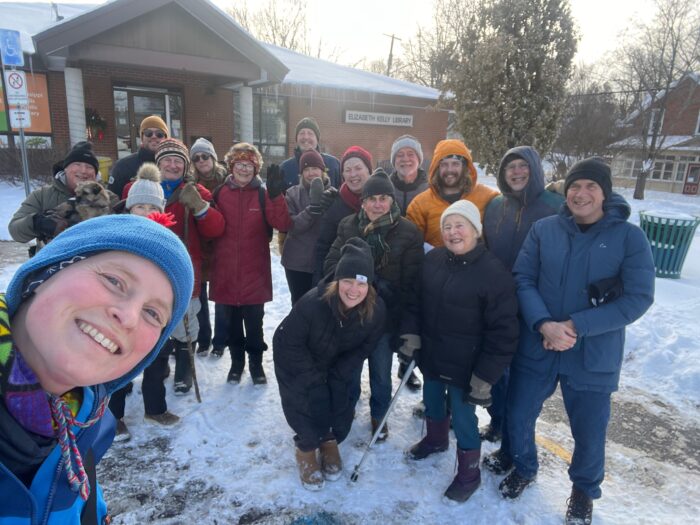 Katharina Kneip surrounded by a small group of local people