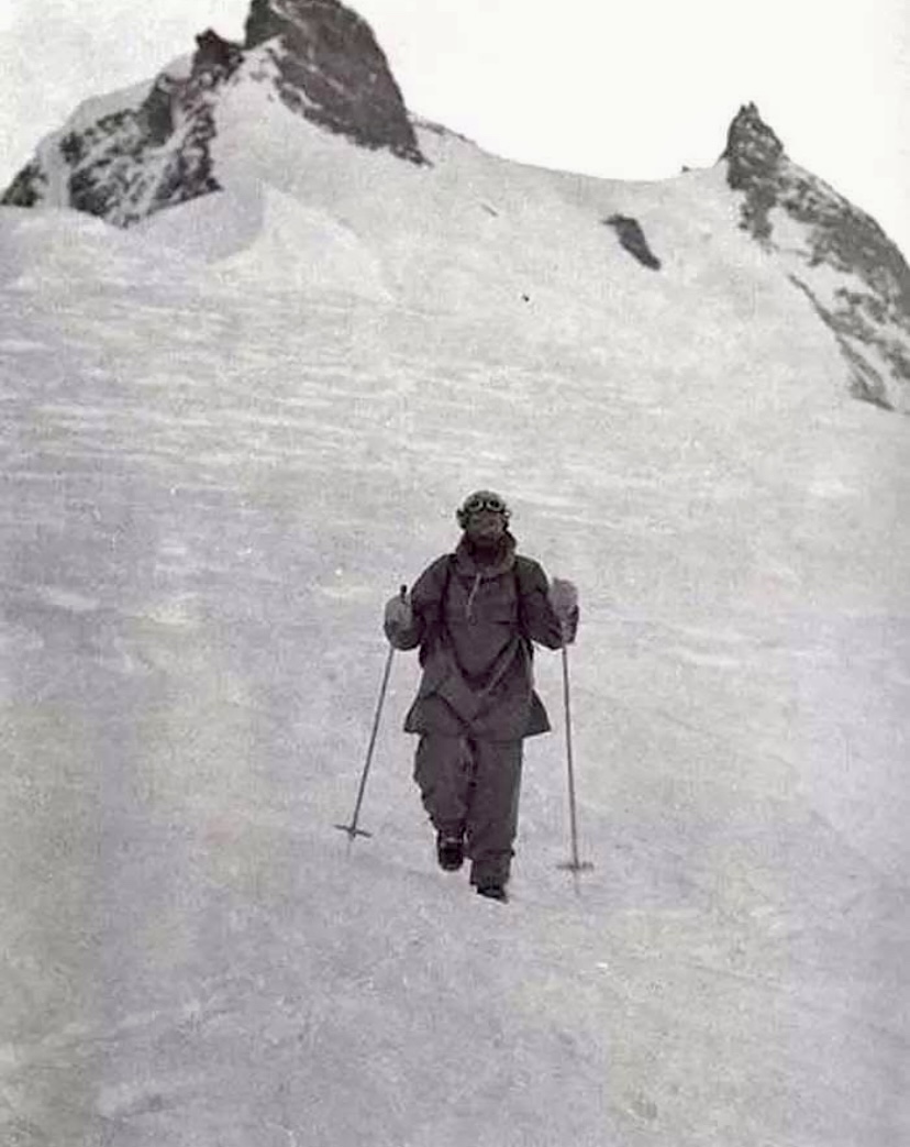 The iconic image of Hermann Buhl descending after his 41-hour solo climb.