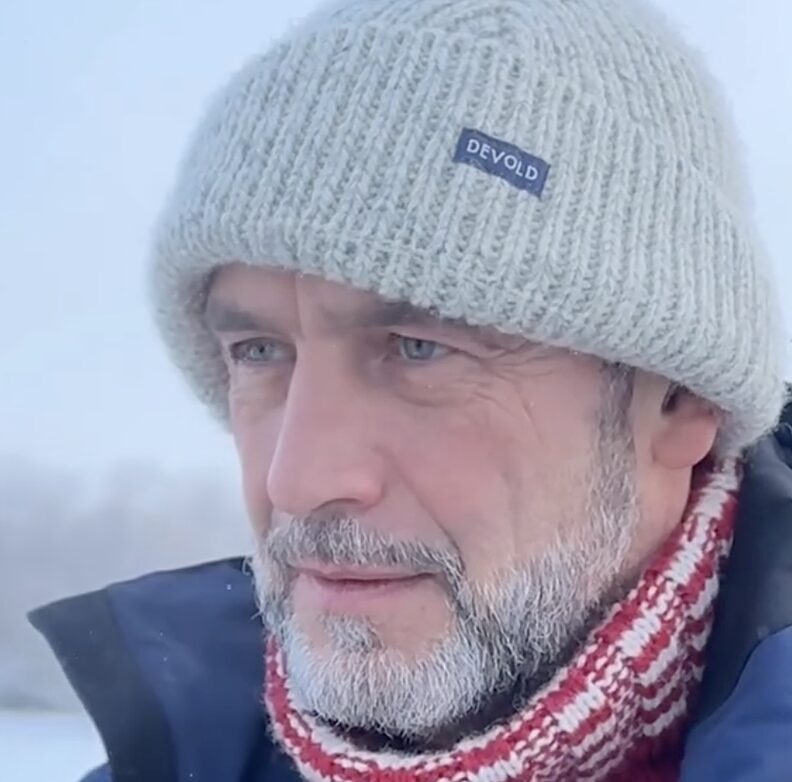 bearded man in hat