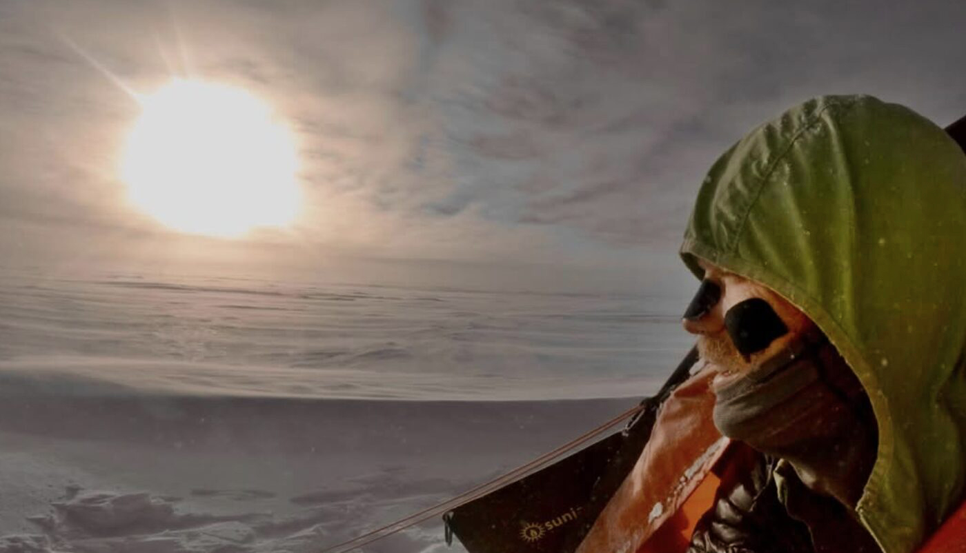 Colin O'Brady beside his tent in Antarctica