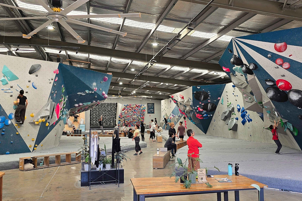 people in a climbing gym