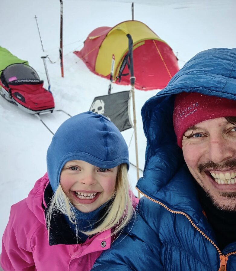 young blonde girl and smiling dad