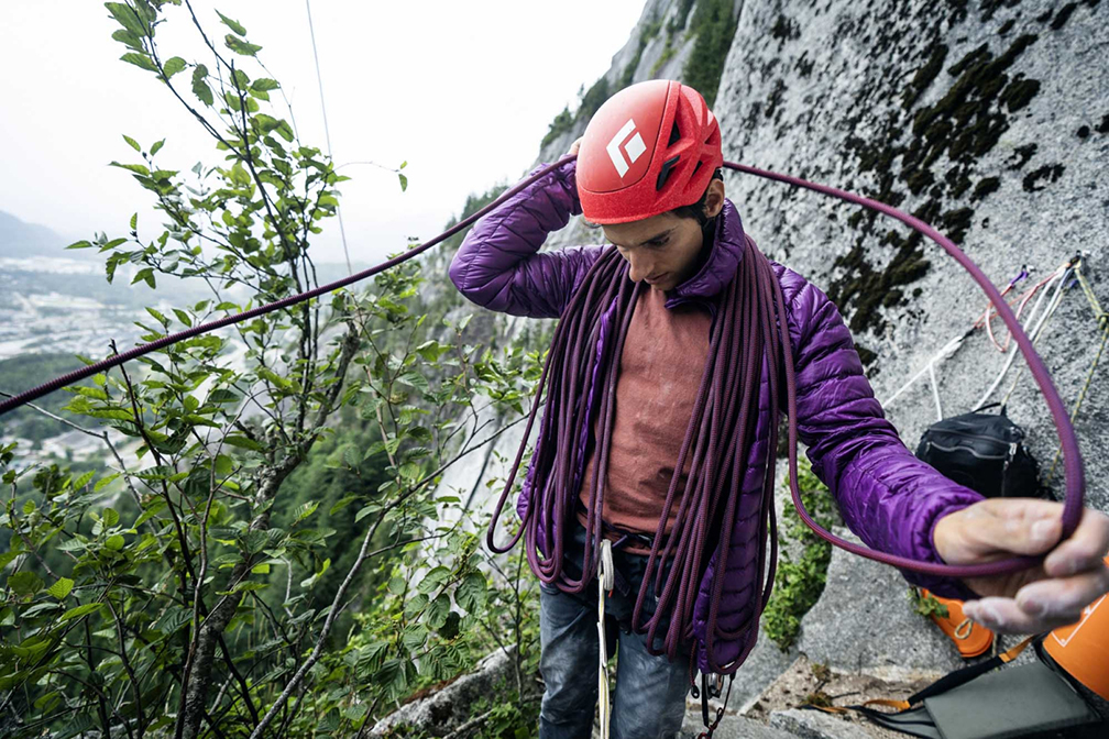climber with rope on ledge