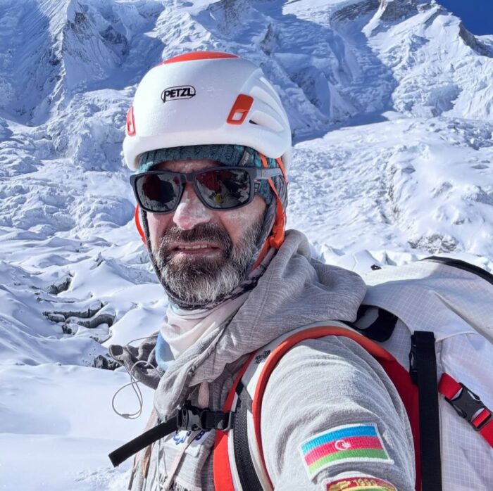 Israfil Ashurli taks a selfie while climbing on Annapurna (seracs in background).