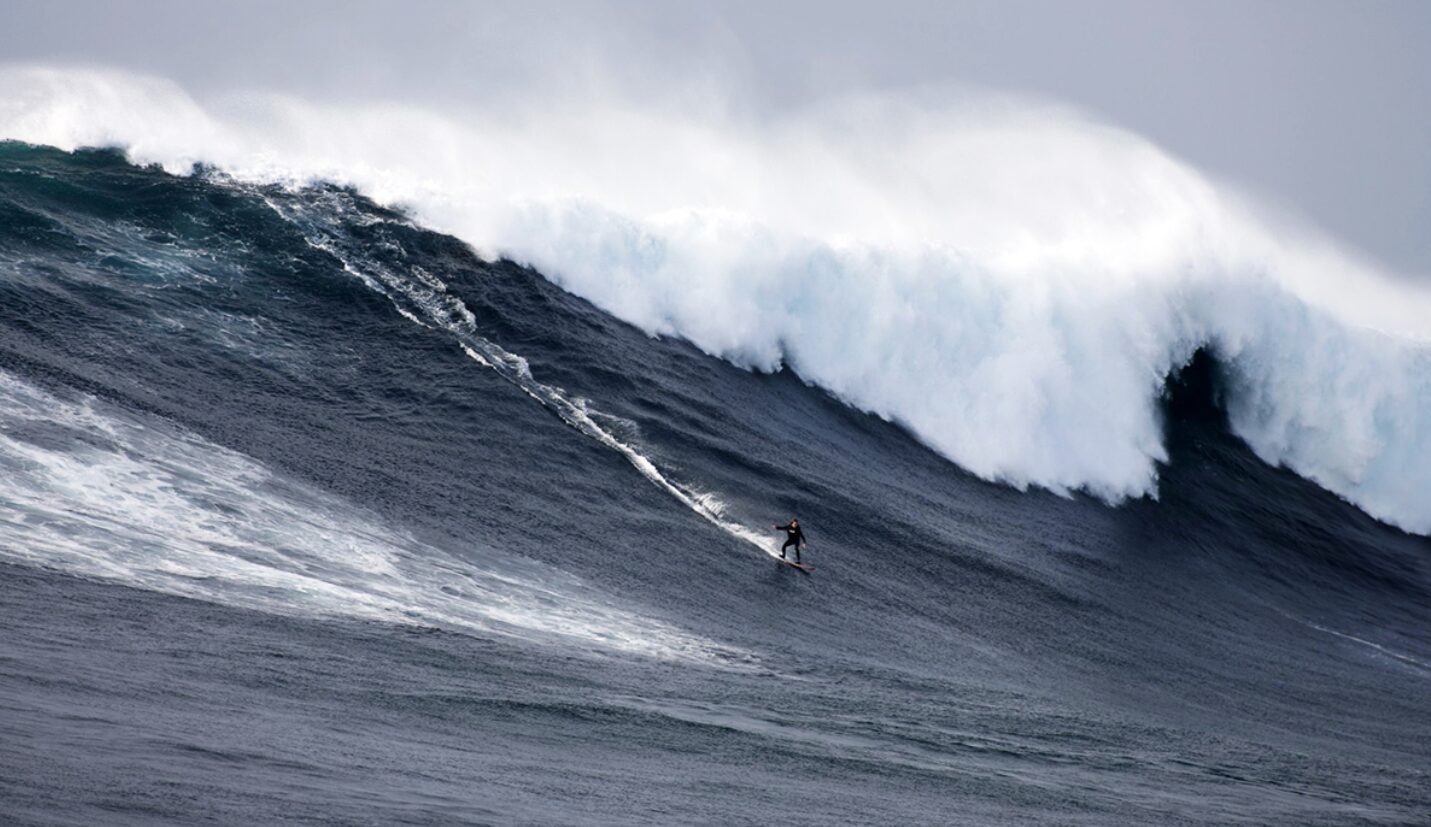 Grant “Twiggy” Baker, rides a massive wave at Cortes Bank.