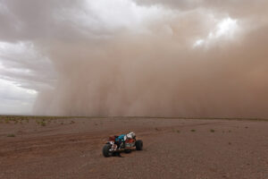 cart in desert sandstorm
