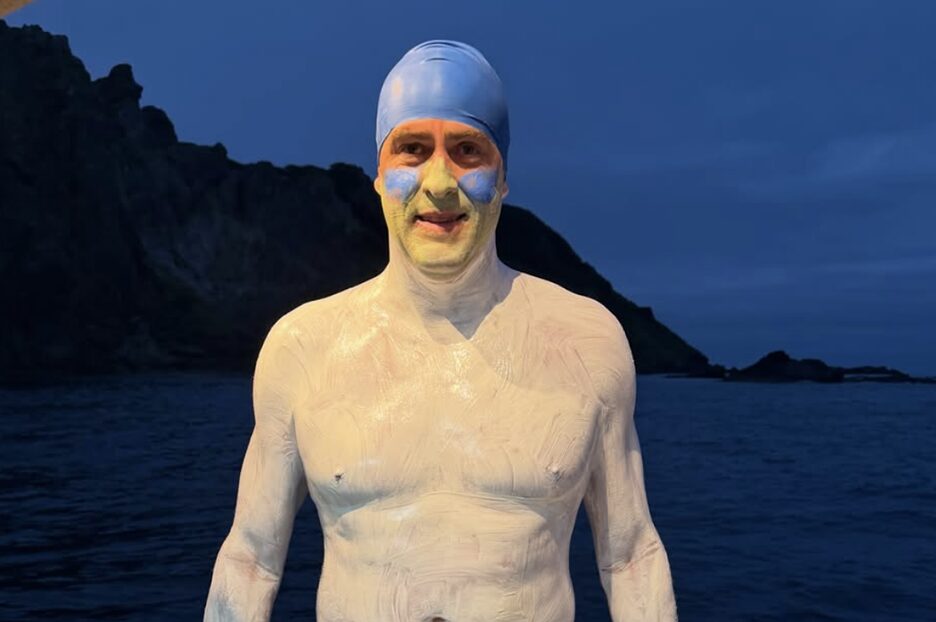 swimmers at twilight