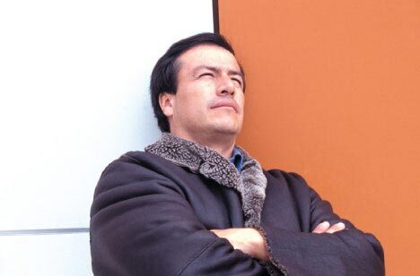 Close shot of Carlos Carsolio leaning against a wall. 