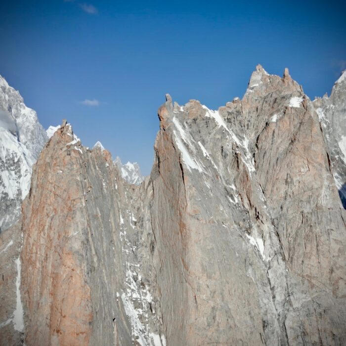 A ragged rocky massif with several points.