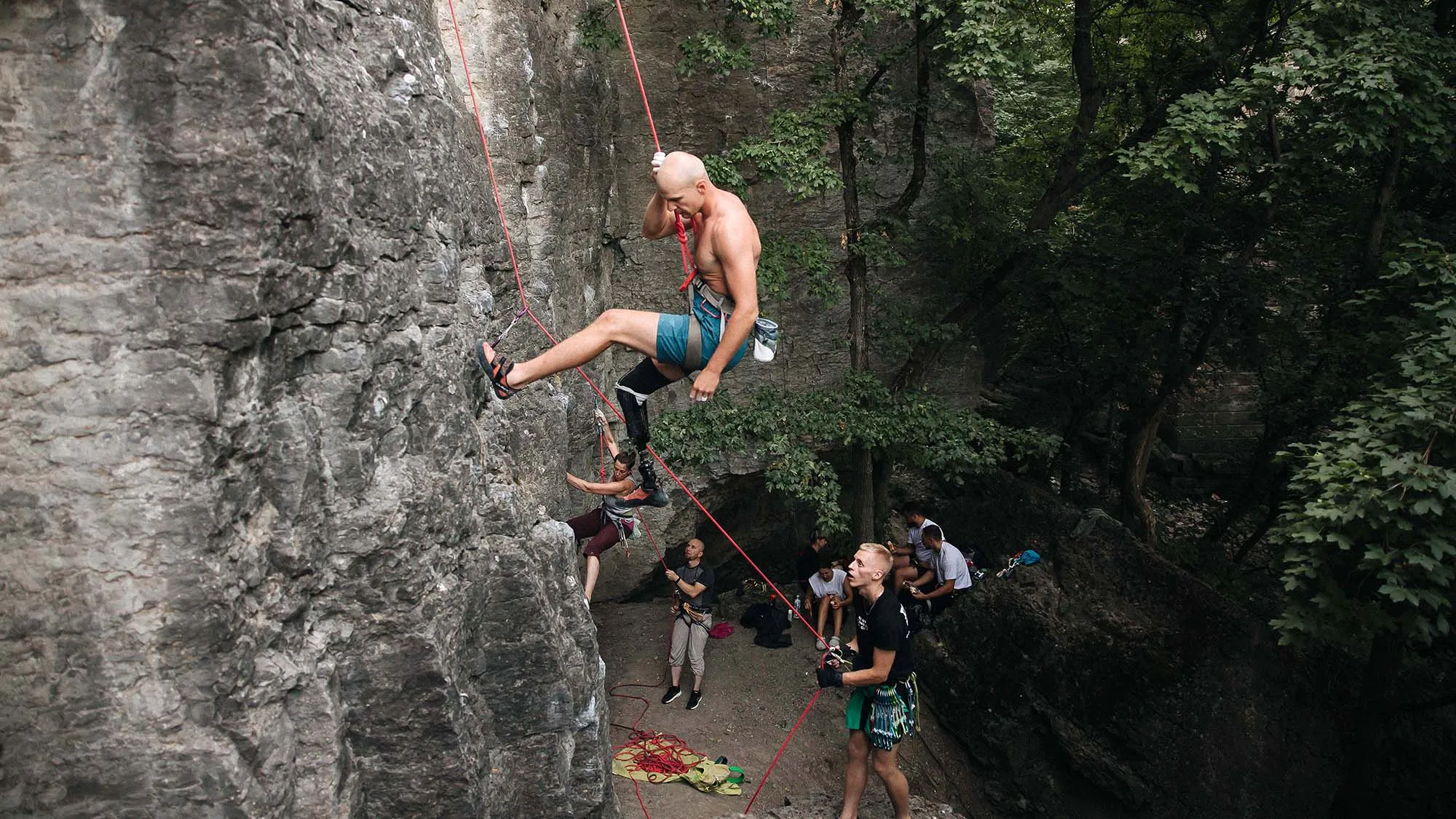 A Ukrainian veteran climbs at a crag in western Ukraine. 